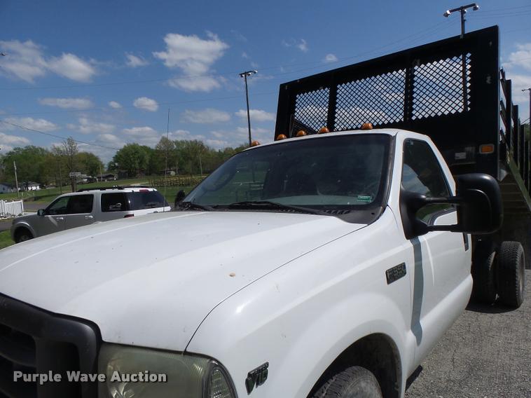 image for item DB1307 2004 Ford F350 flat dump bed pickup truck