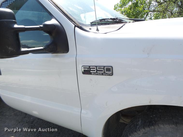 image for item DB1307 2004 Ford F350 flat dump bed pickup truck