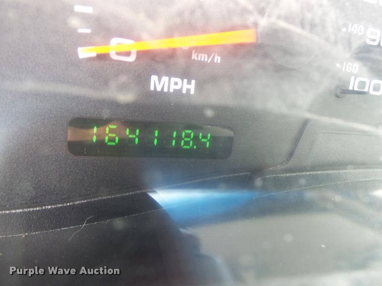 image for item DB1307 2004 Ford F350 flat dump bed pickup truck