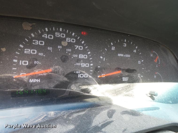 image for item DB1307 2004 Ford F350 flat dump bed pickup truck