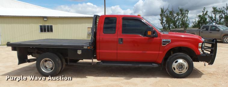 image for item DB2547 2008 Ford F350 XLT Super Duty SuperCab flatbed pickup truck