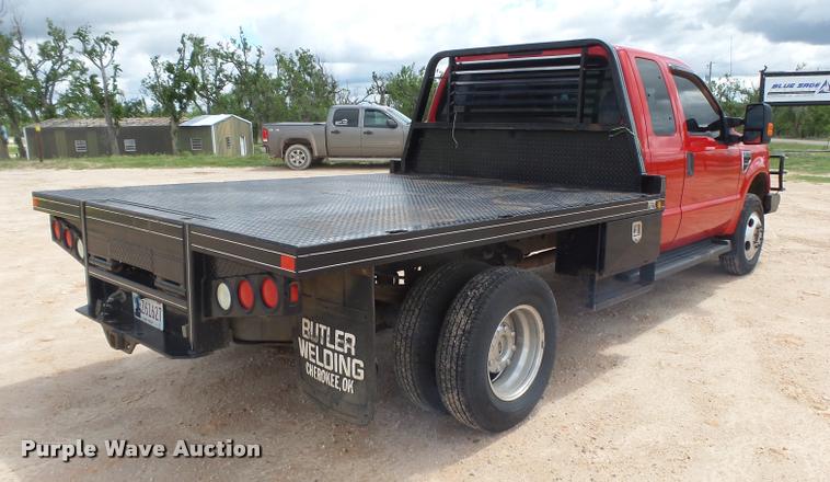 image for item DB2547 2008 Ford F350 XLT Super Duty SuperCab flatbed pickup truck