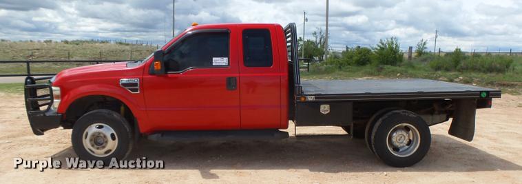 image for item DB2547 2008 Ford F350 XLT Super Duty SuperCab flatbed pickup truck