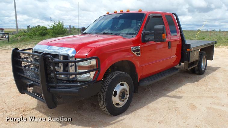 image for item DB2547 2008 Ford F350 XLT Super Duty SuperCab flatbed pickup truck