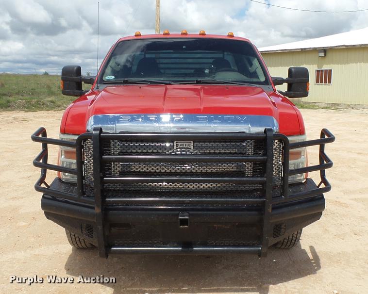 image for item DB2547 2008 Ford F350 XLT Super Duty SuperCab flatbed pickup truck