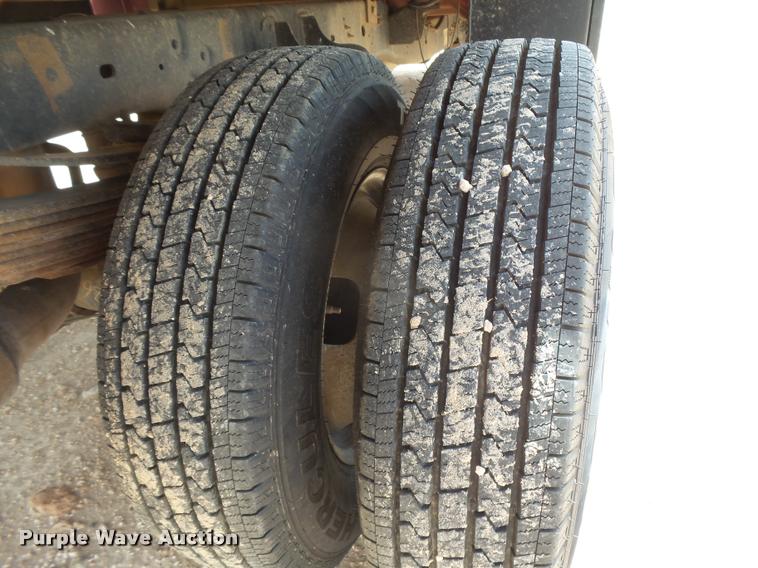 image for item DB2547 2008 Ford F350 XLT Super Duty SuperCab flatbed pickup truck