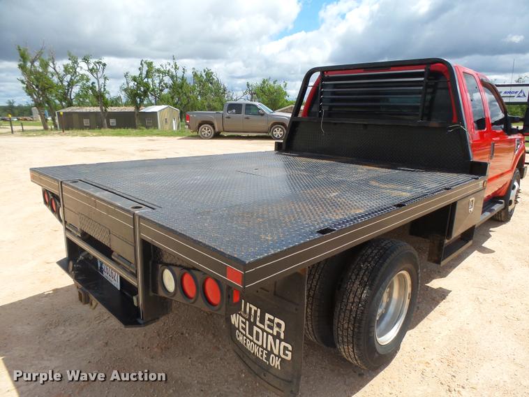 image for item DB2547 2008 Ford F350 XLT Super Duty SuperCab flatbed pickup truck