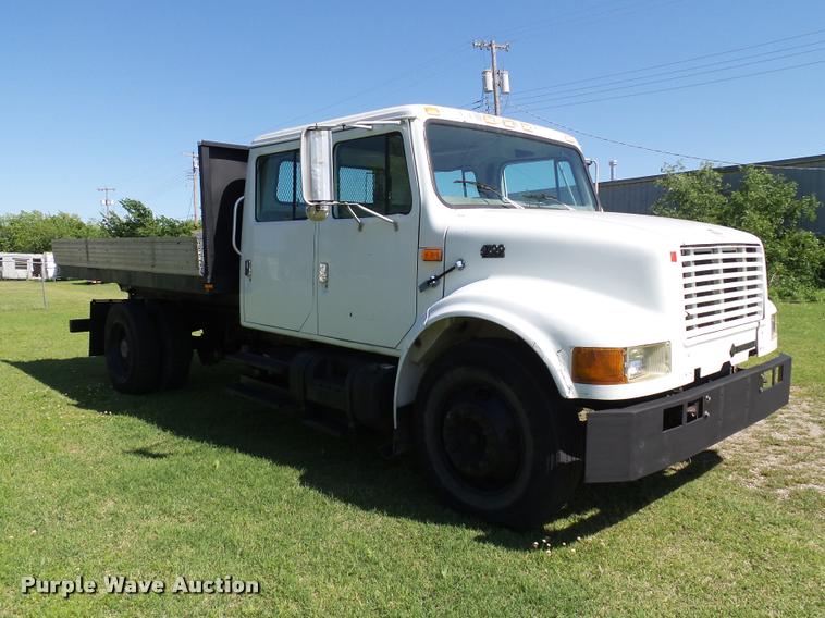 image for item DB4718 1999 International 4700 Crew Cab dump flatbed truck