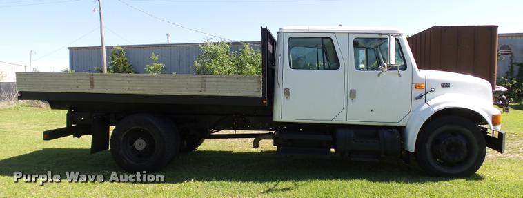 image for item DB4718 1999 International 4700 Crew Cab dump flatbed truck