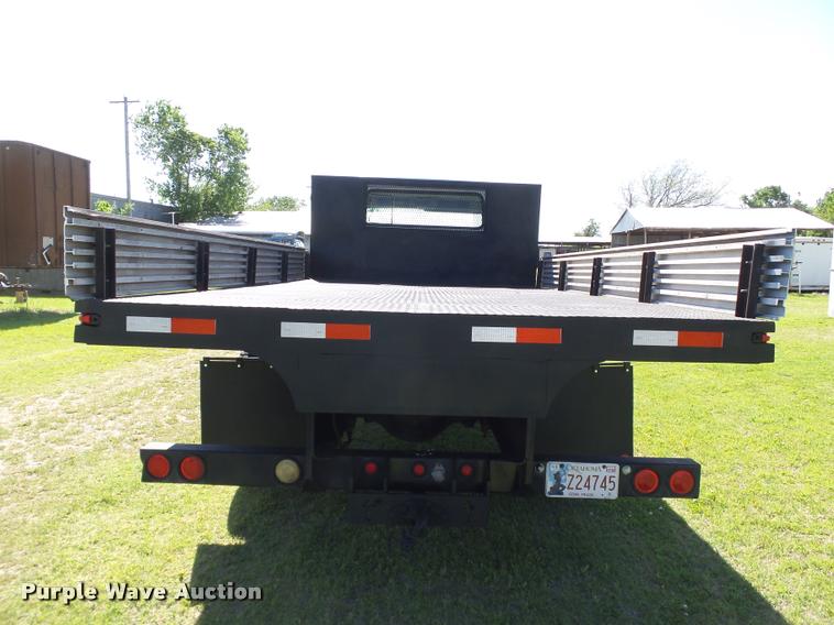 image for item DB4718 1999 International 4700 Crew Cab dump flatbed truck