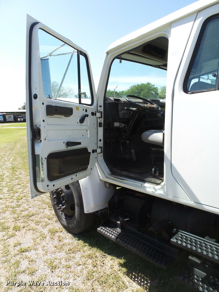 image for item DB4718 1999 International 4700 Crew Cab dump flatbed truck