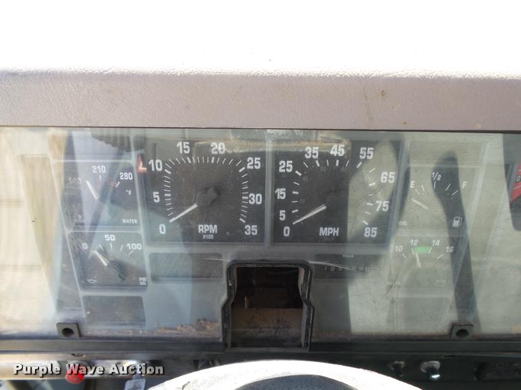 image for item DB4718 1999 International 4700 Crew Cab dump flatbed truck