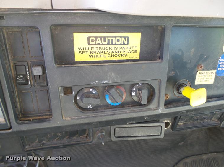 image for item DB4718 1999 International 4700 Crew Cab dump flatbed truck