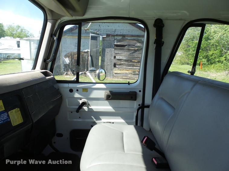 image for item DB4718 1999 International 4700 Crew Cab dump flatbed truck