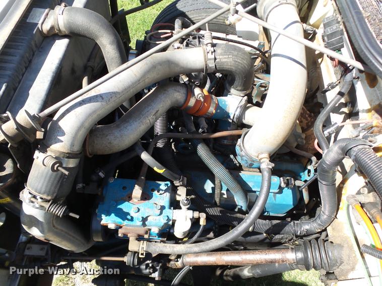 image for item DB4718 1999 International 4700 Crew Cab dump flatbed truck