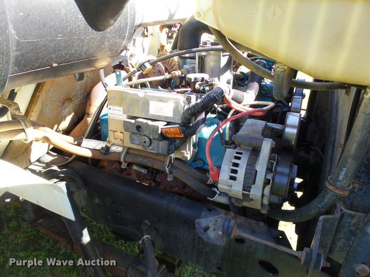 image for item DB4718 1999 International 4700 Crew Cab dump flatbed truck