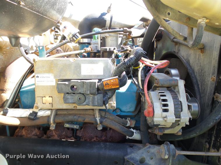 image for item DB4718 1999 International 4700 Crew Cab dump flatbed truck