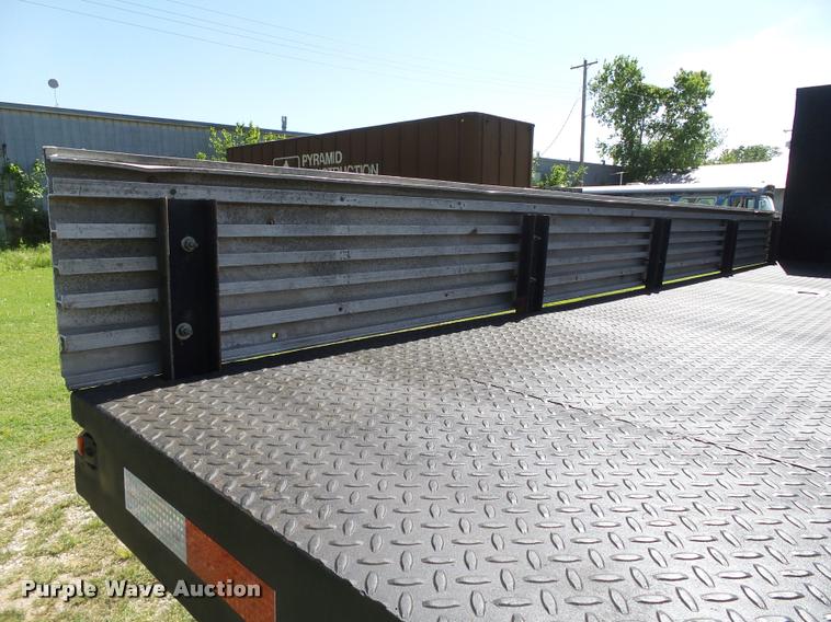 image for item DB4718 1999 International 4700 Crew Cab dump flatbed truck