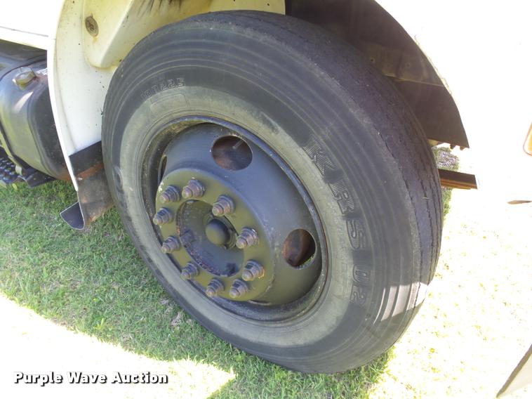 image for item DB4718 1999 International 4700 Crew Cab dump flatbed truck