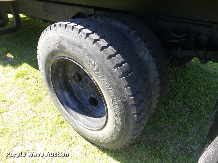 image for item DB4718 1999 International 4700 Crew Cab dump flatbed truck