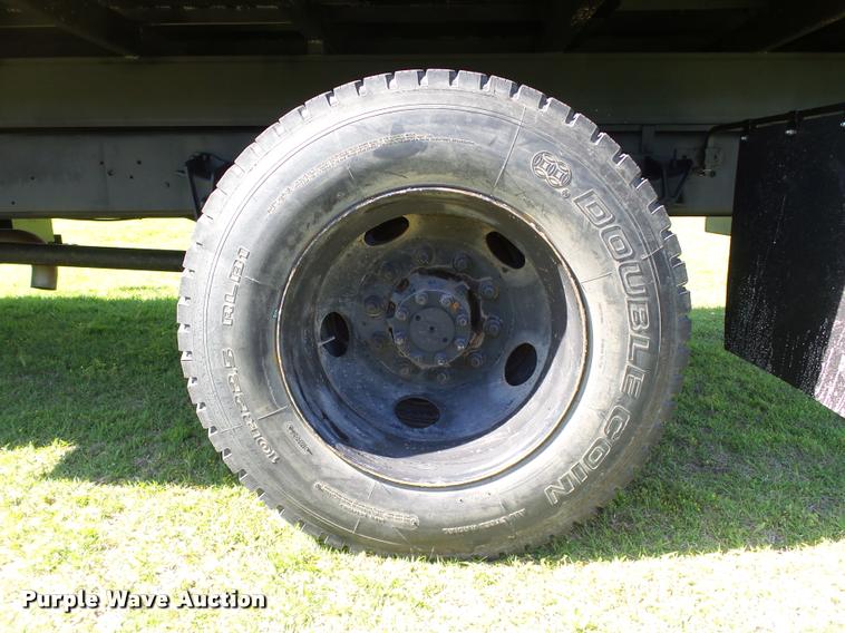 image for item DB4718 1999 International 4700 Crew Cab dump flatbed truck