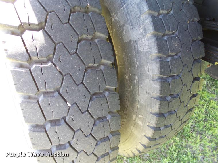 image for item DB4718 1999 International 4700 Crew Cab dump flatbed truck