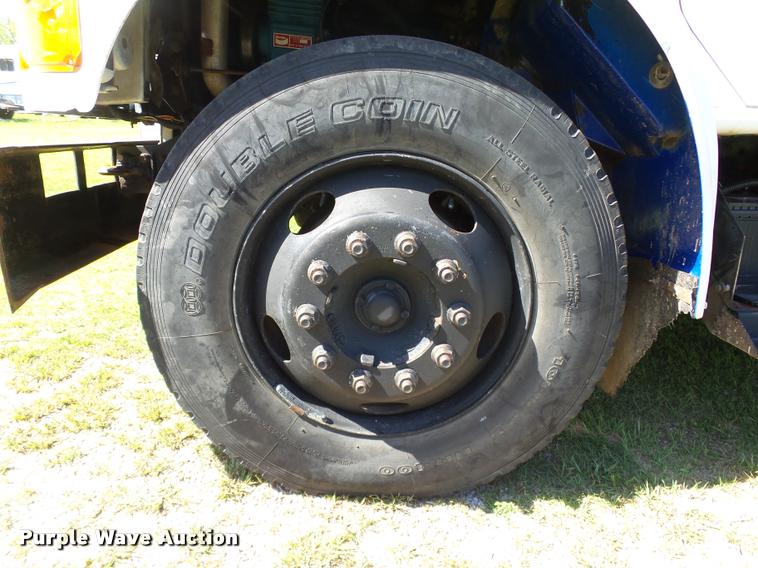 image for item DB4718 1999 International 4700 Crew Cab dump flatbed truck