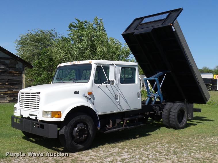image for item DB4718 1999 International 4700 Crew Cab dump flatbed truck