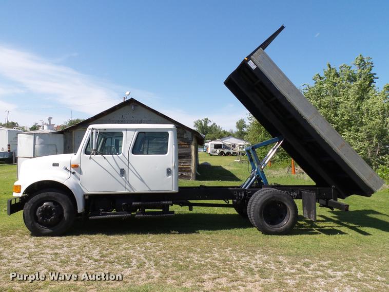 image for item DB4718 1999 International 4700 Crew Cab dump flatbed truck