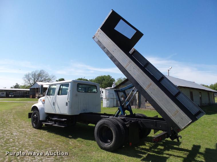 image for item DB4718 1999 International 4700 Crew Cab dump flatbed truck