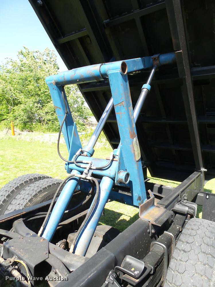 image for item DB4718 1999 International 4700 Crew Cab dump flatbed truck