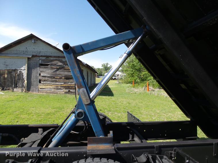 image for item DB4718 1999 International 4700 Crew Cab dump flatbed truck