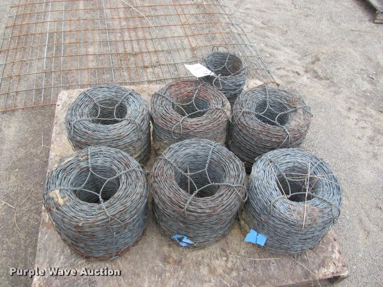 image for item K4819 (7) rolls of barb wire fencing