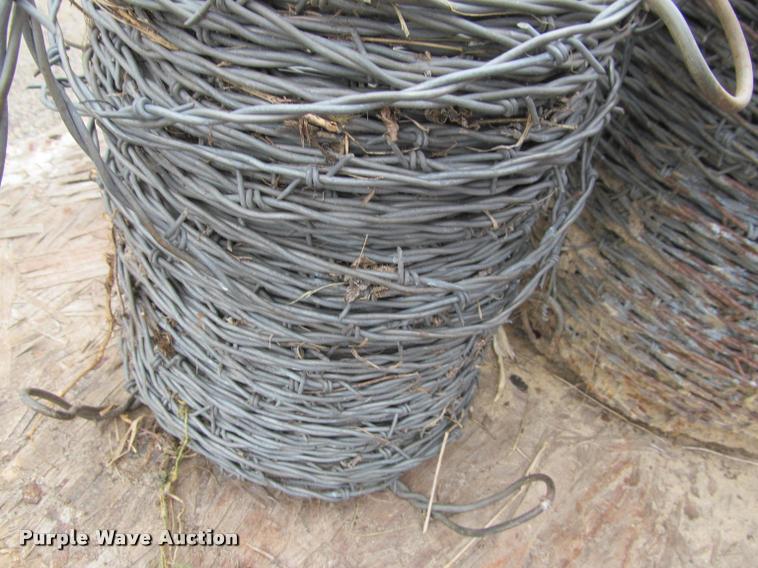 image for item K4819 (7) rolls of barb wire fencing