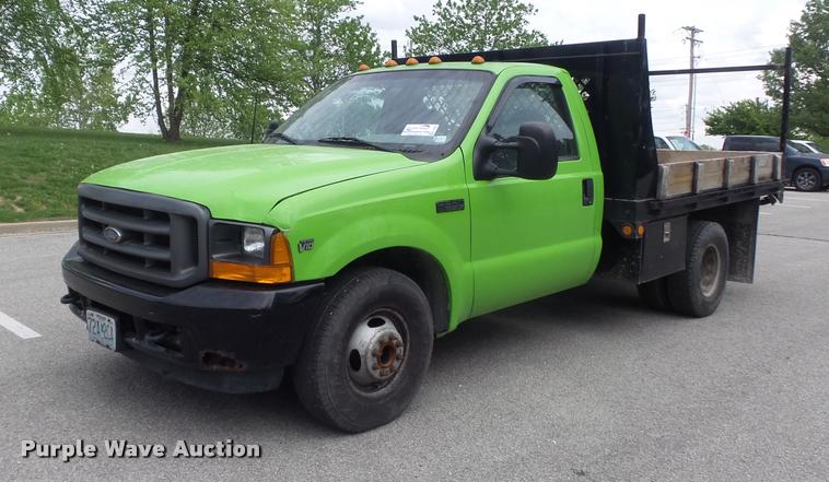 image for item K7660 2001 Ford F350 Super Duty XL flatbed pickup truck