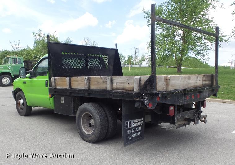 image for item K7660 2001 Ford F350 Super Duty XL flatbed pickup truck