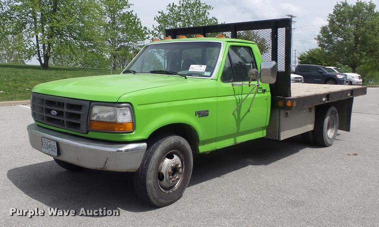 image for item K7661 1997 Ford F350 XL flatbed pickup truck