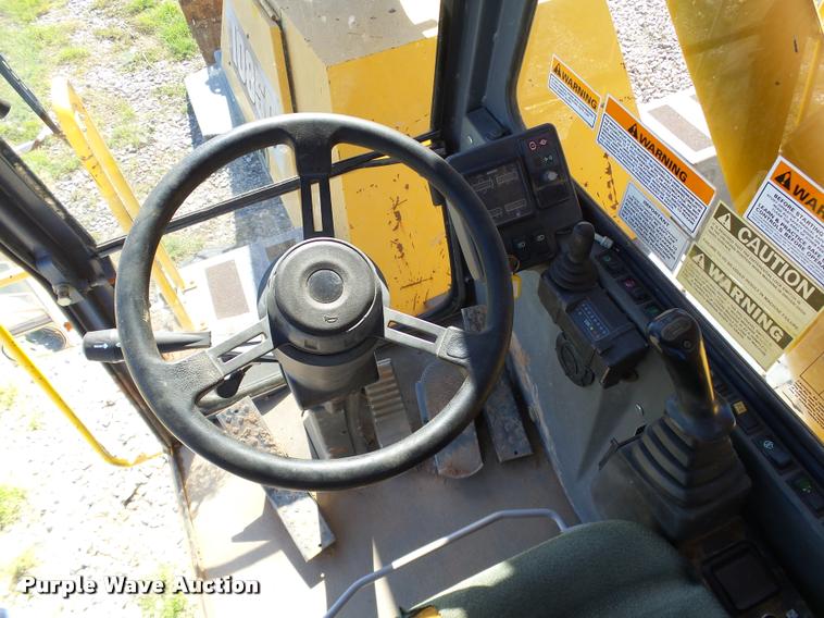 image for item DB4688 2002 Badger 1085D rubber tire excavator