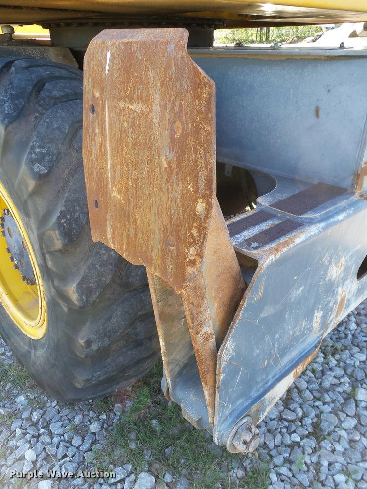 image for item DB4688 2002 Badger 1085D rubber tire excavator