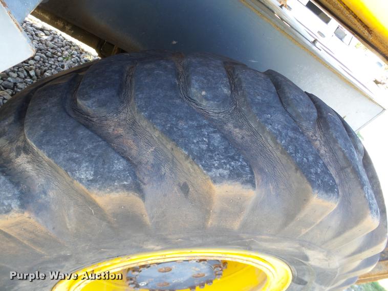 image for item DB4688 2002 Badger 1085D rubber tire excavator