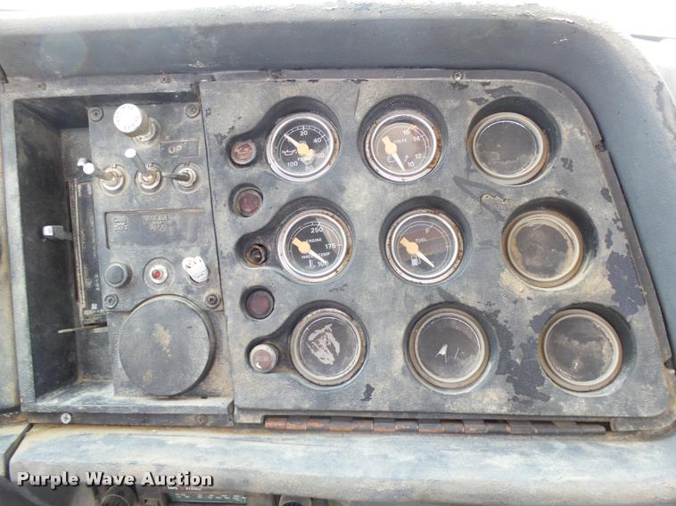 image for item DH9590 1984 Ford LT9000 flatbed truck with crane