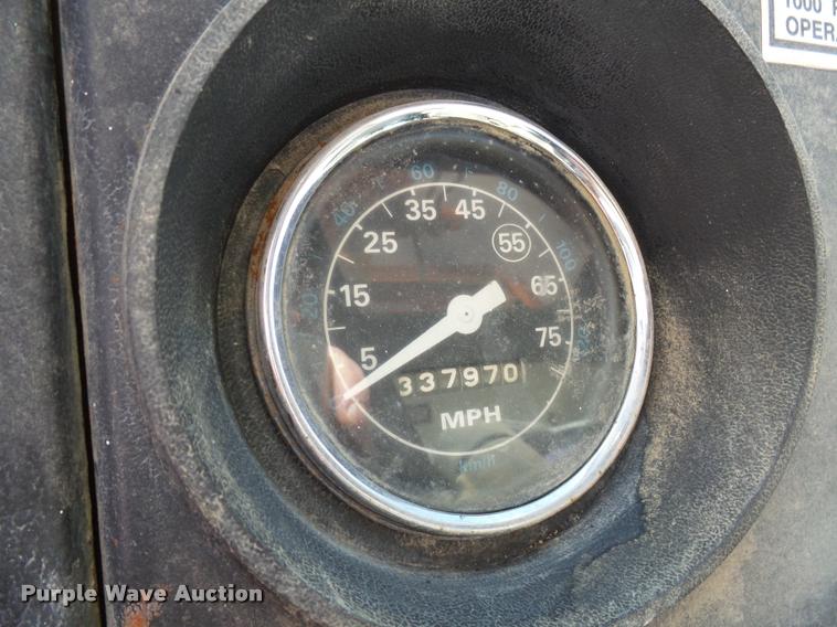 image for item DH9590 1984 Ford LT9000 flatbed truck with crane