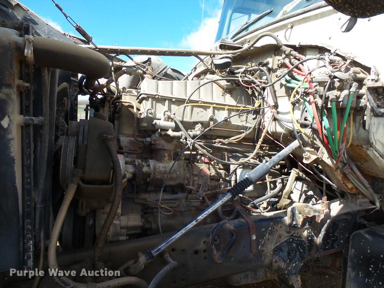 image for item DH9590 1984 Ford LT9000 flatbed truck with crane