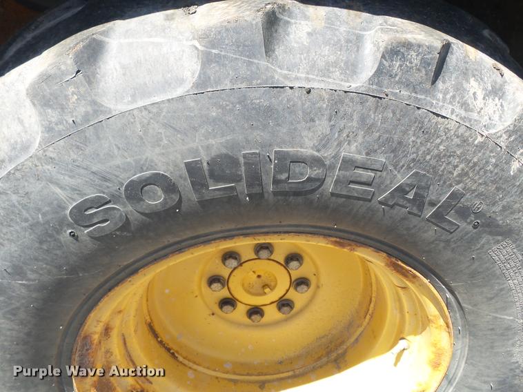 image for item K3279 2002 John Deere 310SG backhoe