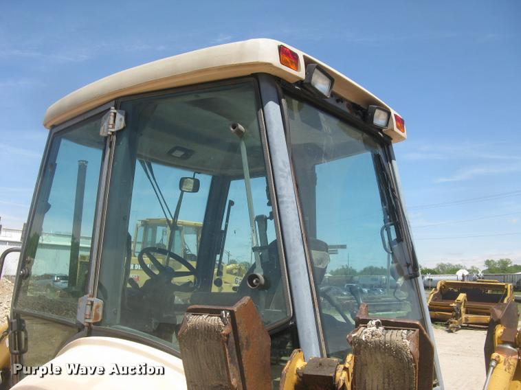 image for item L2371 New Holland 555E backhoe