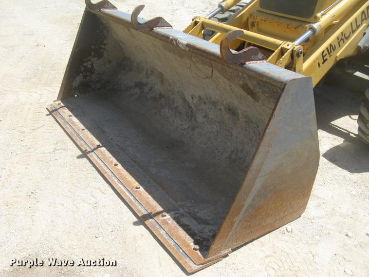 image for item L2371 New Holland 555E backhoe