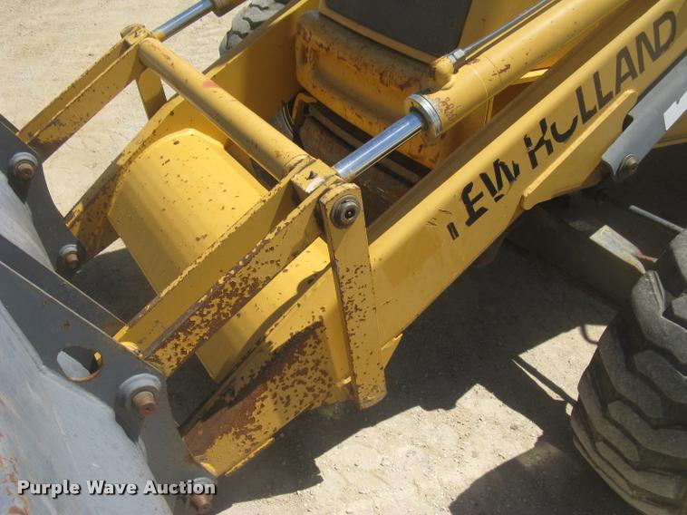 image for item L2371 New Holland 555E backhoe