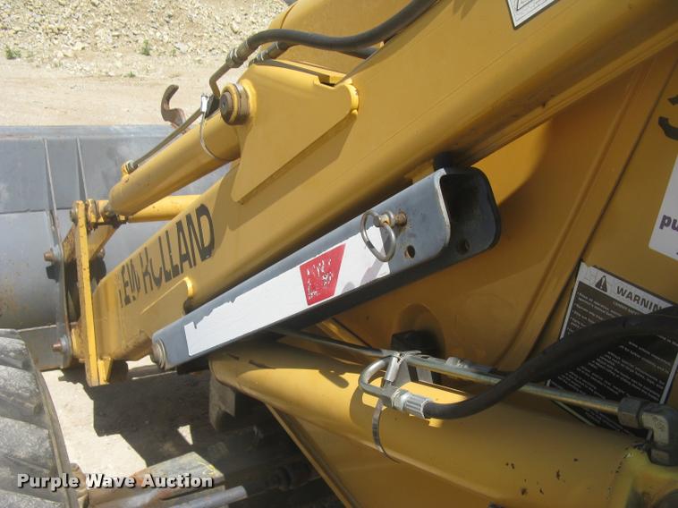 image for item L2371 New Holland 555E backhoe