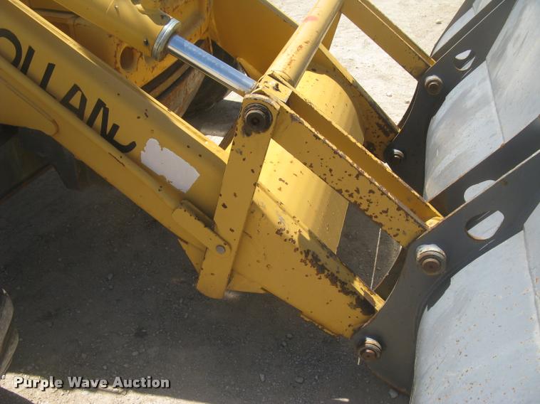 image for item L2371 New Holland 555E backhoe