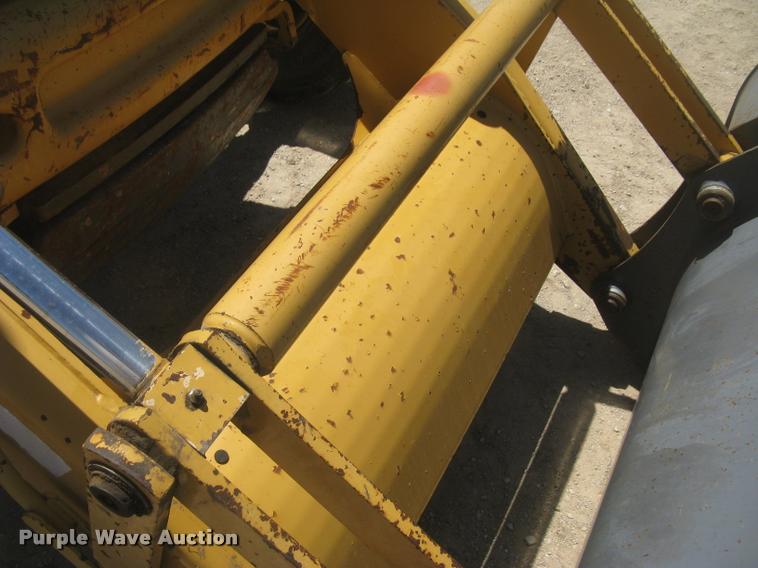 image for item L2371 New Holland 555E backhoe